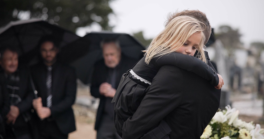 child_at_funeral